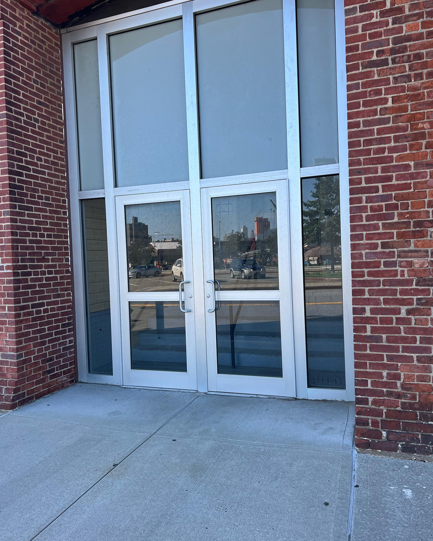 Commercial glass storefront installation by Ray's Glass Brooklyn