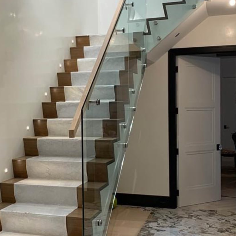 Glass railing installation by Ray's Glass Brooklyn